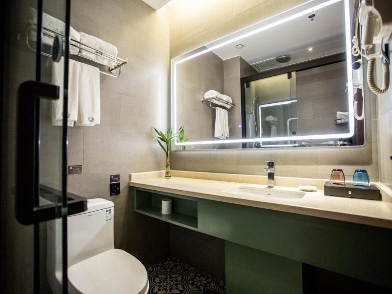 Gemei Hotel Luoyang Longmen High-Speed Railway Station Esterno foto