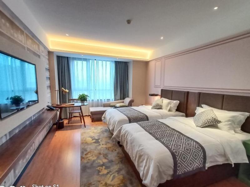 Gemei Hotel Luoyang Longmen High-Speed Railway Station Esterno foto