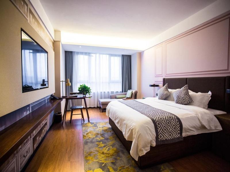 Gemei Hotel Luoyang Longmen High-Speed Railway Station Esterno foto
